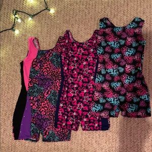 Lot of three girls gymnastic leotards size 6/7